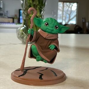 Levitating action figure yoda